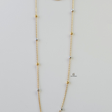 GOLD AND RHODIUM BEADED CHAIN