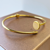 GOLD NAIL CUFF BANGLE