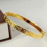 LV MONOGRAM HINGED BANGLE