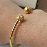 GOLD OPEN TORGUE BANGLE