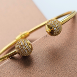 GOLD OPEN TORGUE BANGLE