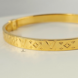 LV MONOGRAM HINGED BANGLE