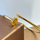 GOLD NAIL CUFF BANGLE