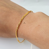 TWISTED GOLD BRACELET