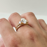 OVAL CUT THREE STONE RING SET