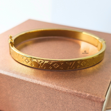 LV MONOGRAM HINGED BANGLE