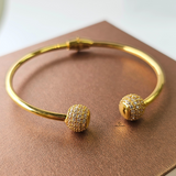 GOLD OPEN TORGUE BANGLE