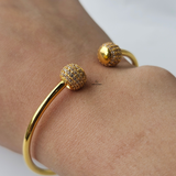 GOLD OPEN TORGUE BANGLE