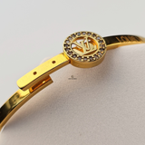 GOLD LV INITIAL CUFF BELT BANGLE