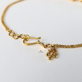 GOLD BRACELET WITH DIAMOND CUT BEADS