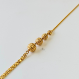 GOLD SWIRL BEADED BRACELET