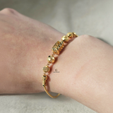 INTRICATE BEADED TUBE BRACELET