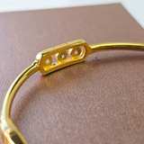 3 DIAMANTE MOVE HINGED BANGLE