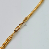 TWISTED GOLD BRACELET