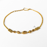 GOLD BRACELET WITH DIAMOND CUT BEADS