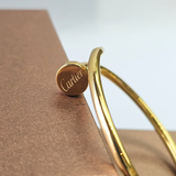 GOLD NAIL CUFF BANGLE