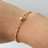 GOLD BRACELET WITH CUBIC ZIRCONIA STONE BALL