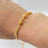 GOLD BRACELET WITH DIAMOND CUT BEADS