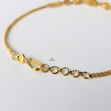 GOLD BRACELET WITH DIAMOND CUT BEADS