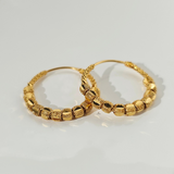 HOOP EARRINGS WITH DIAMOND CUT DESIGN