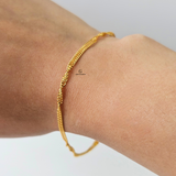 TWISTED GOLD BRACELET