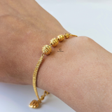 GOLD SWIRL BEADED BRACELET