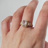EMERALD CUT 3-STONE PAVE RING